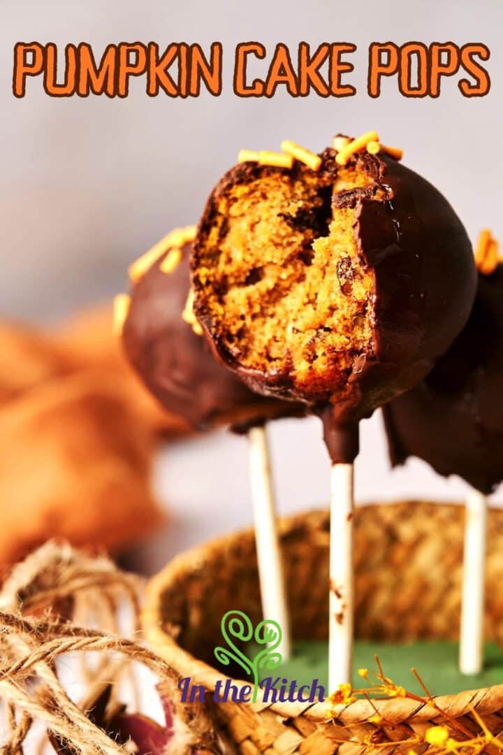 Pumpkin cake pops in basket with text overlay that says 'pumpkin cake pops'.