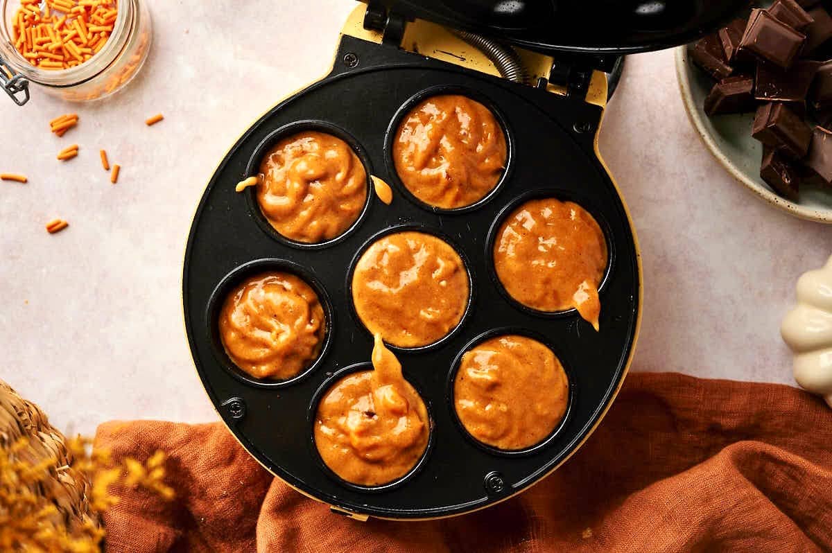 Pumpkin cake pop batter in cake pop maker.