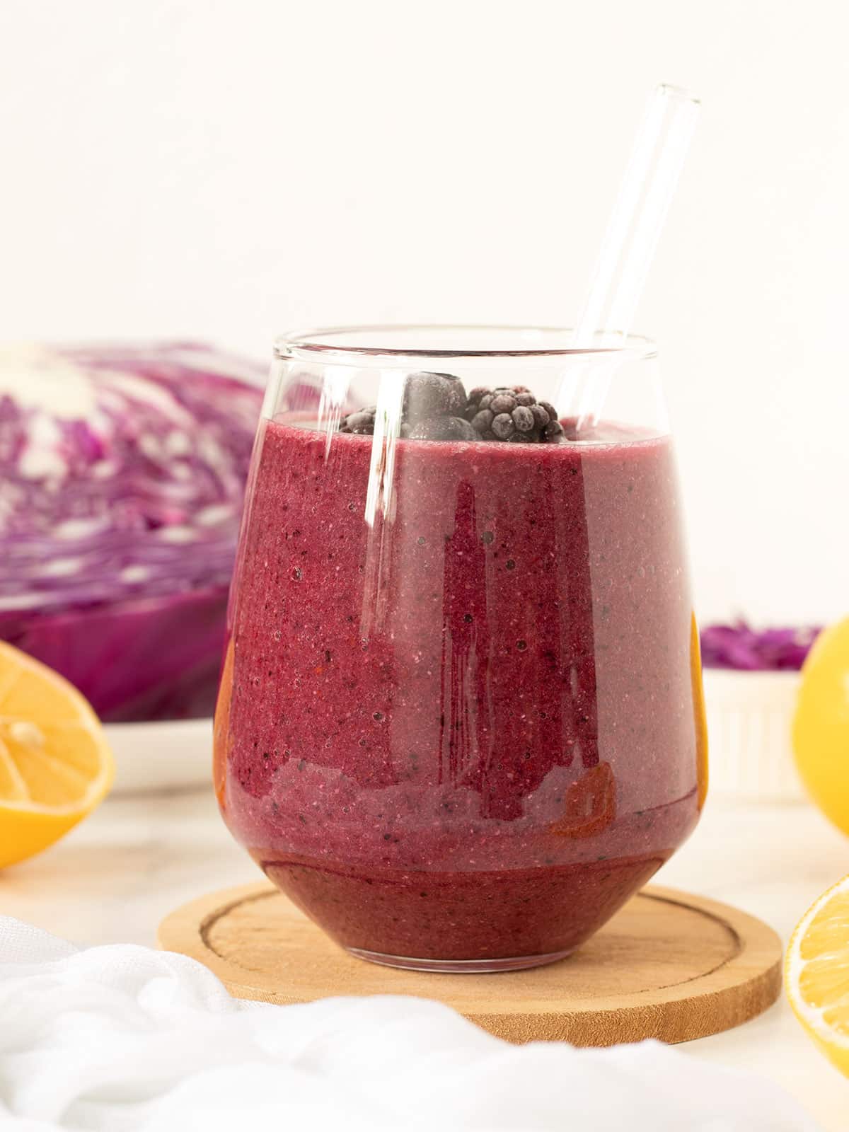 Purple cabbage smoothie blended in glass.