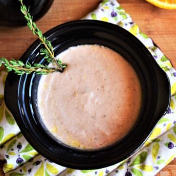 Red wine cheese dip in mini slow cooker.