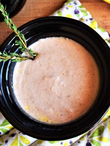 Red wine cheese dip in mini slow cooker.