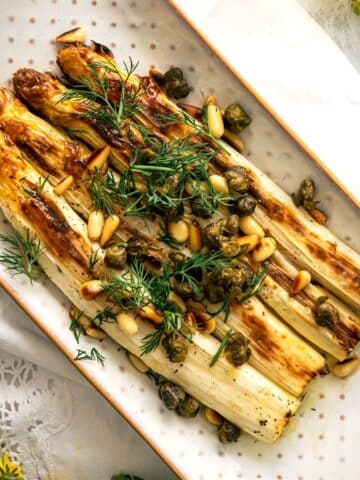 Roasted white asparagus with capers and fresh dill.