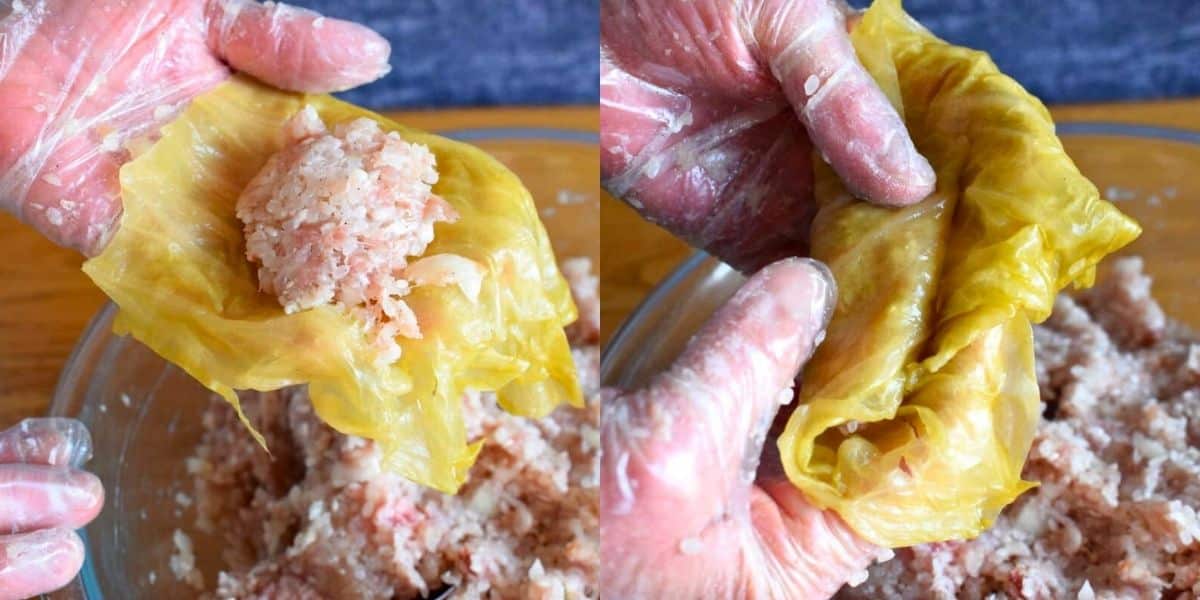 Cabbage roll getting filled and rolled up.