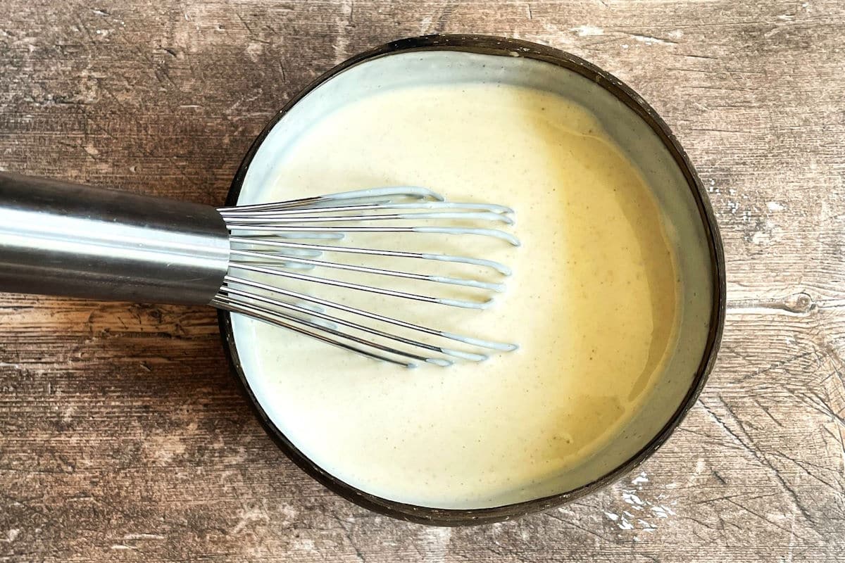 Special sauce in bowl with whisk.