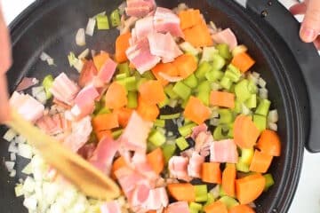 Veggies and bacon in electric skillet.