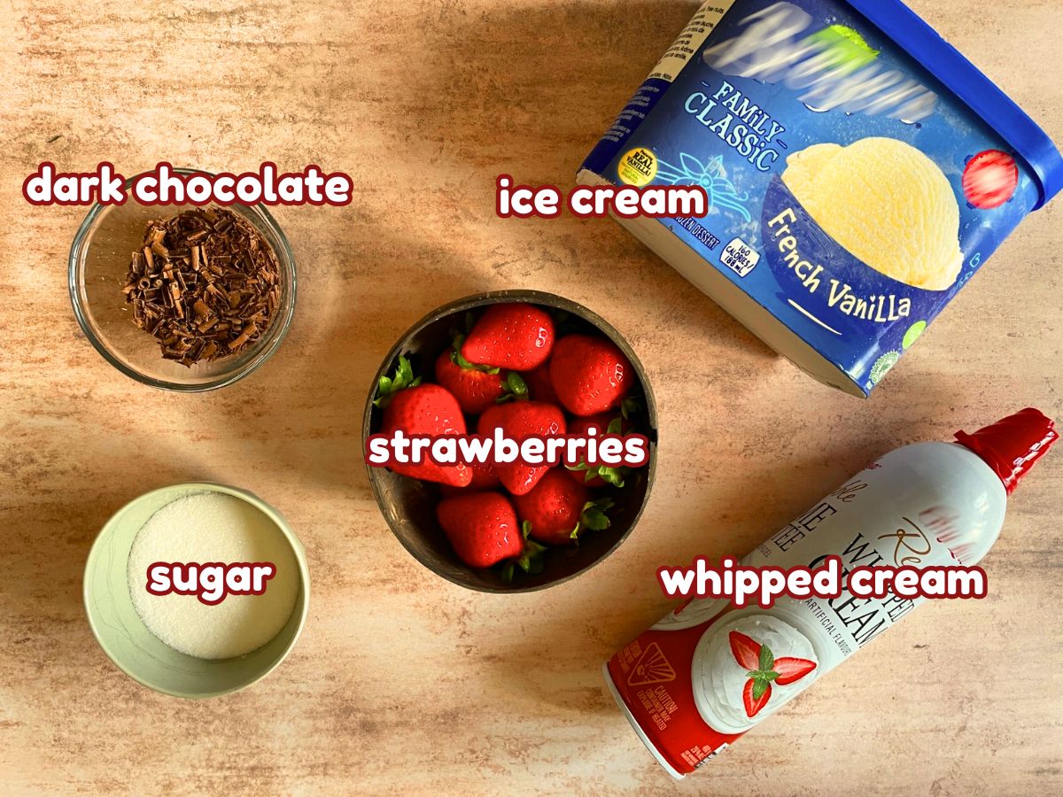 Strawberry ice cream sundae ingredients labeled.