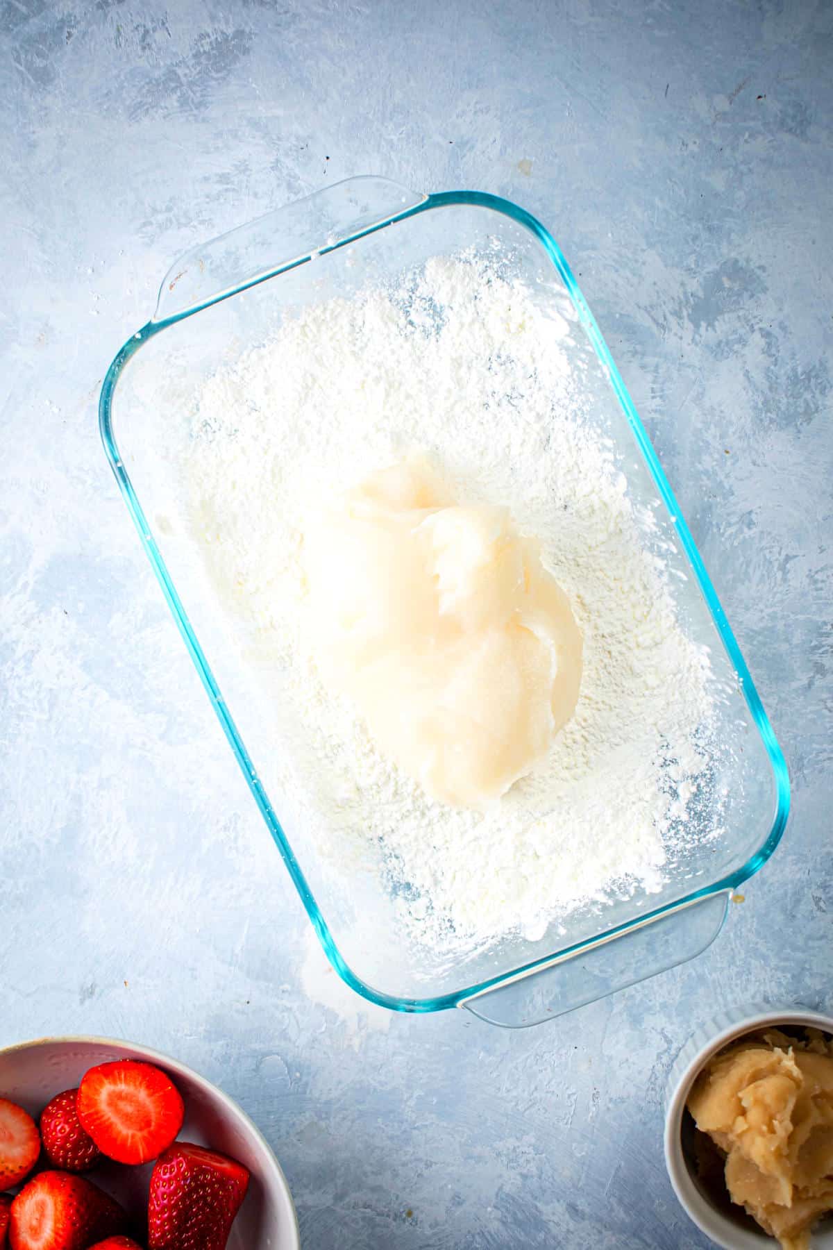 Mochi dough in cornstarch powdered dish.