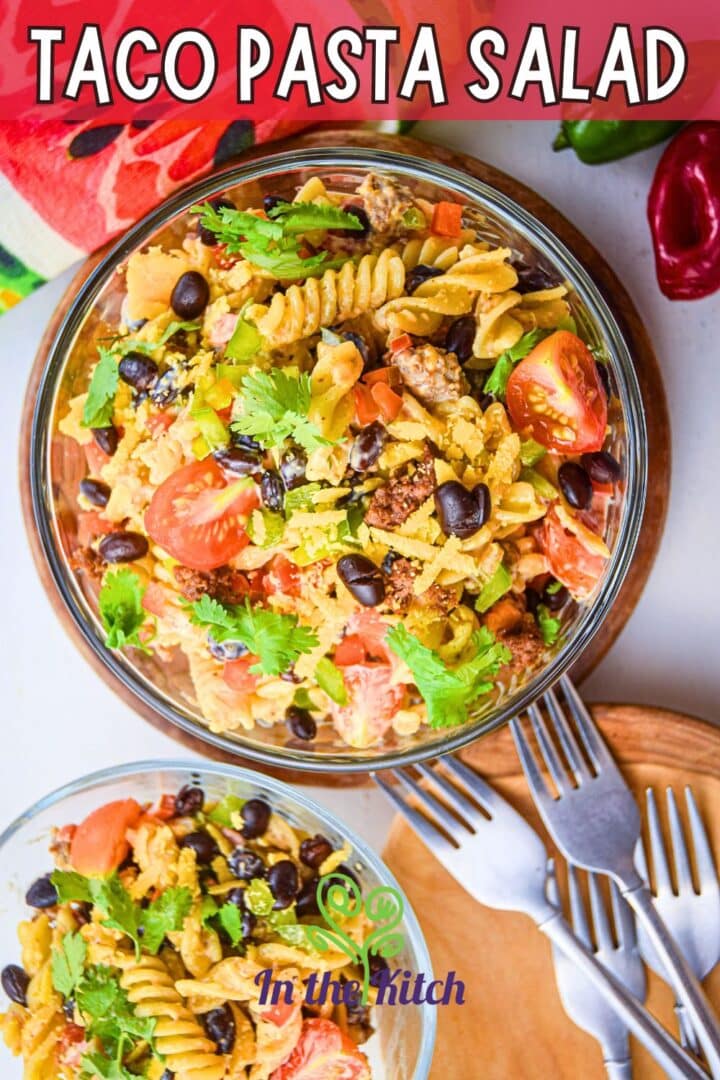 Taco pasta salad in bowls with forks and text overlay that says 'taco pasta salad'.