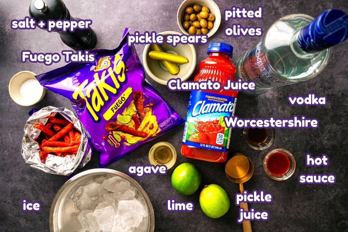Takis Caesar cocktail ingredients labeled on dark background.