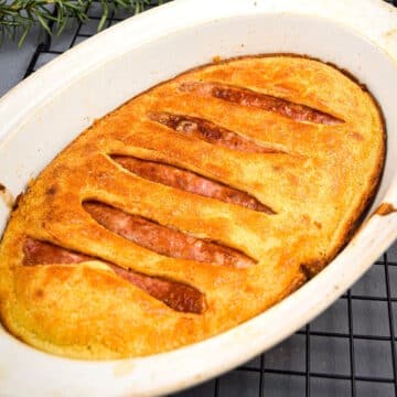 Toad in the hole in casserole dish.