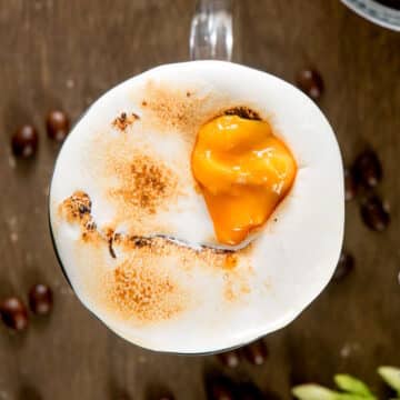 Toasted marshmallow pumpkin spice latte in coffee mug.