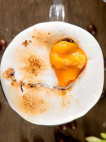Toasted marshmallow pumpkin spice latte in coffee mug.