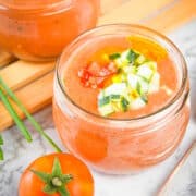Tomato & Watermelon Gazpacho Soup in a small, wide jar.