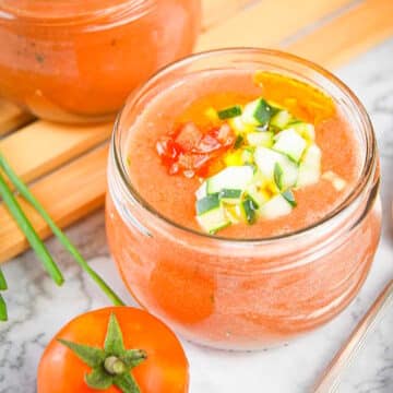 Tomato & Watermelon Gazpacho Soup in a small, wide jar.