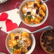 Shrimp curry with rice in two bowls.