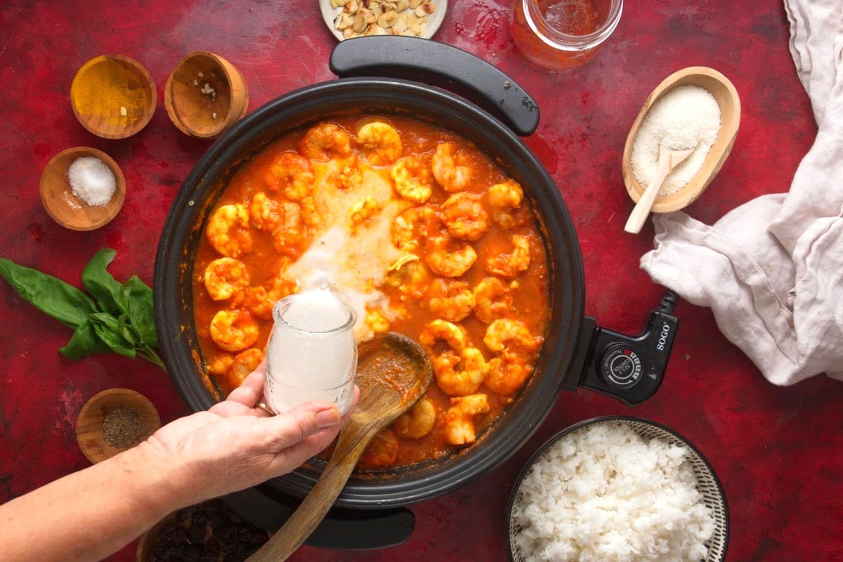 Curry, shrimp and coconut milk in electric skillet.
