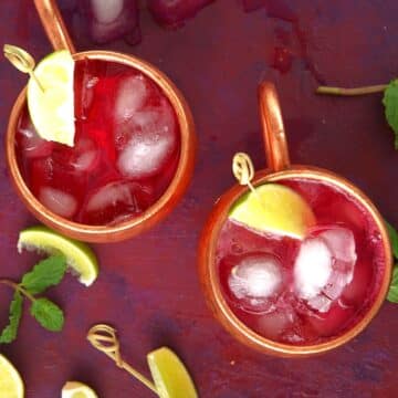 Virgin Moscow mule in copper mugs with lime garnish.