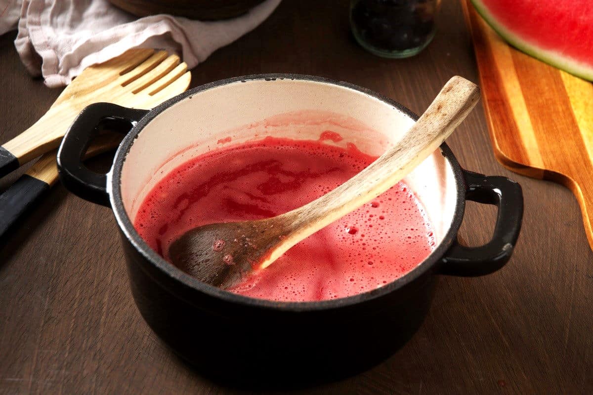Watermelon purée in saucepan.